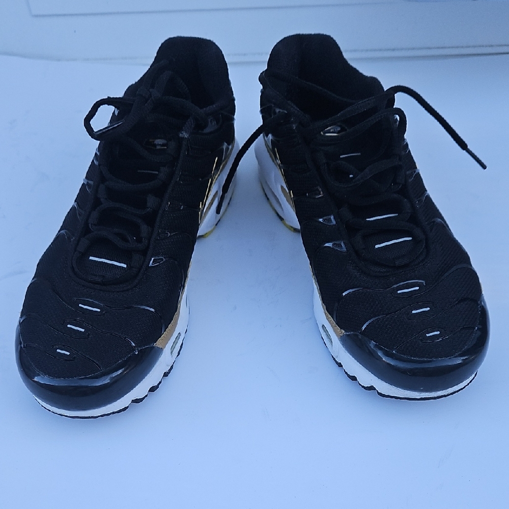 Nike Gray Sneakers with Gold Details